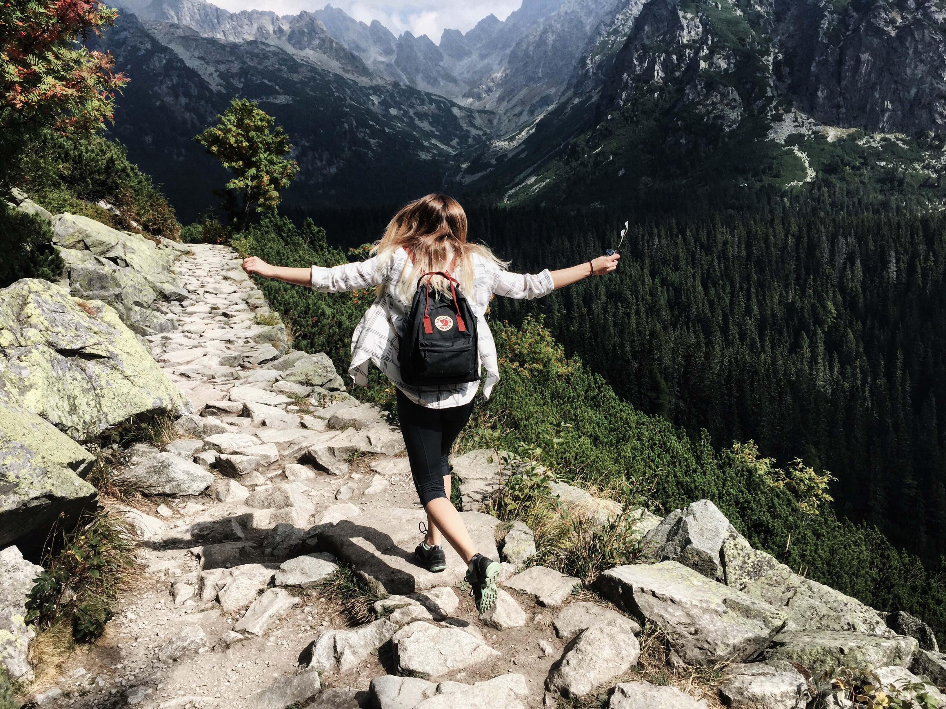 woman-walking-in-mountains